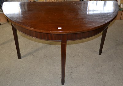 Lot 1135 - A 19th century demilune hall table, raised on...