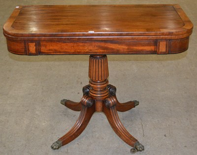 Lot 1144 - A 19th century mahogany flip-top card table,...