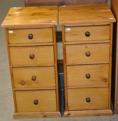 Lot 1145 - A pair of late 19th century pine four drawer...
