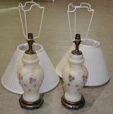 Lot 1151 - A pair of 20th century ceramic table lamps of...
