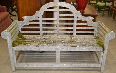 Lot 1124 - A Thakeham style garden bench, in the manner...