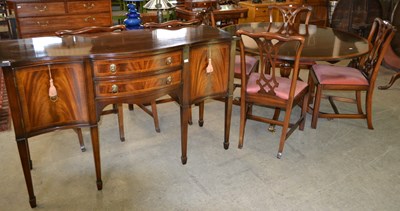 Lot 1167 - A reproduction mahogany dining suite, to...