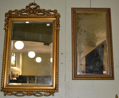Lot 1026 - A reproduction Neoclassical style wall mirror...