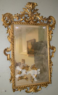 Lot 1033 - A 19th century Venetian giltwood wall mirror,...