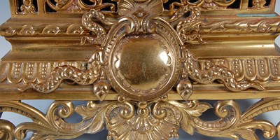 Lot 224 - A late 19th/ early 20th century gilt brass...