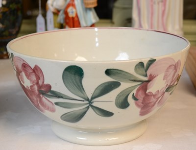 Lot 766 - A late 19th century spongeware pottery bowl,...