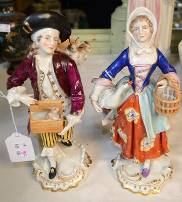 Lot 764 - A pair of Chelsea style ceramic figures, gold...
