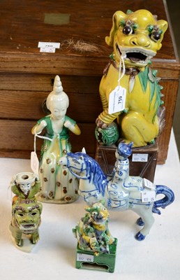 Lot 759 - A Chinese porcelain Foo dog statue, in...
