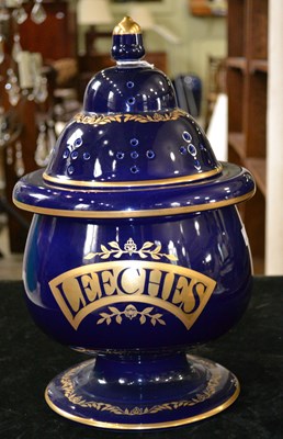 Lot 794 - A ceramic "LEECHES" jar with pierced cover,...