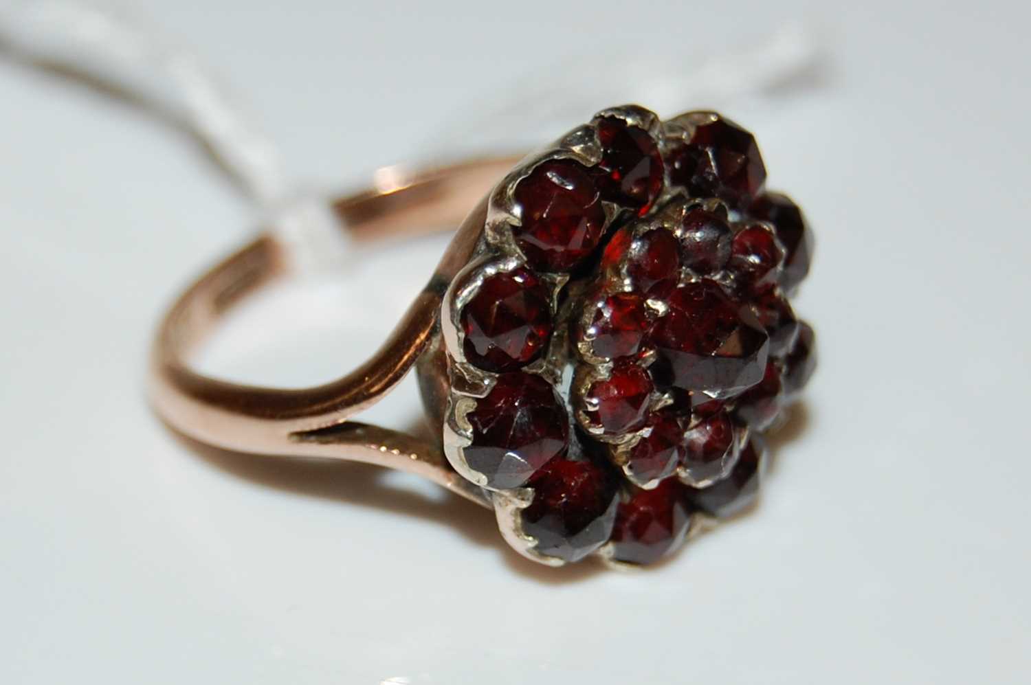 Lot 45 - A vintage 9ct gold and garnet coloured glass...