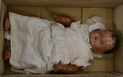 Lot 892 - An early 20th century baby doll, features...