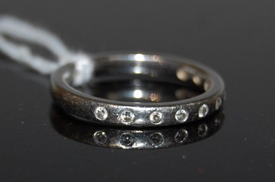 Lot 46 - A platinum and diamond ten stone ring, stamped...
