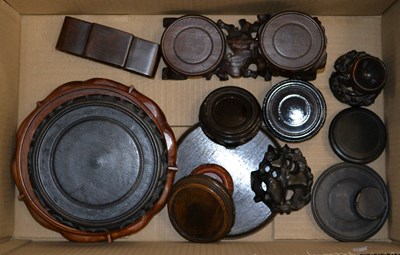 Lot 906 - A box of assorted hardwood vase stands in the...