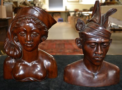 Lot 802 - A hardwood half-length male sculpture of an...