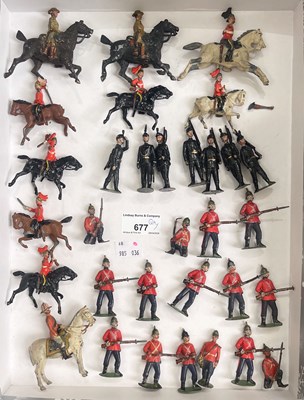 Lot 677 - A group of assorted military toy figures, to...