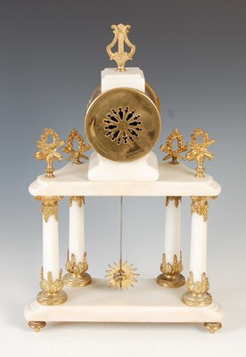 Lot 225 - A late 19th century French white marble gilt...
