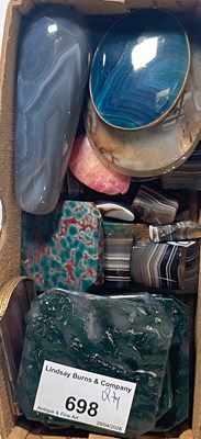 Lot 698 - A box of assorted cut and polished stones, to...