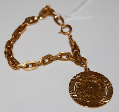 Lot 52 - An 18ct gold chain-link bracelet suspending...