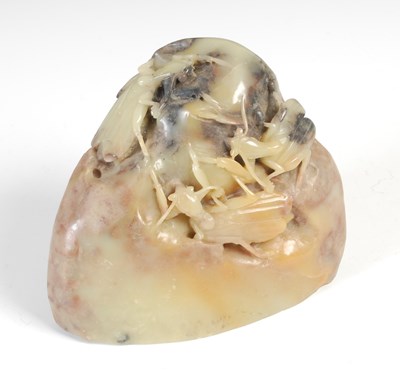 Lot 664 - A Chinese soapstone boulder, featuring...