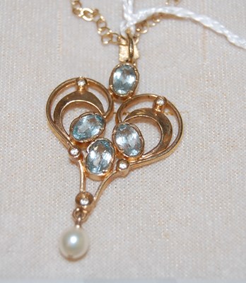 Lot 56 - A 9ct gold aquamarine, diamond and pearl set...