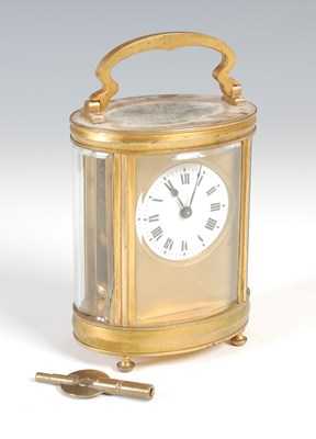 Lot 641 - A 20th century French style brass carriage...