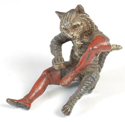 Lot 660 - A cold painted bronze figurine of Puss in...