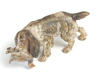 Lot 661 - A cold painted bronze figurine of a Cocker...