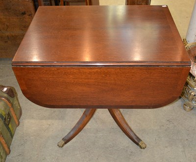 Lot 1070 - A mahogany drop leaf pedestal table, in the...