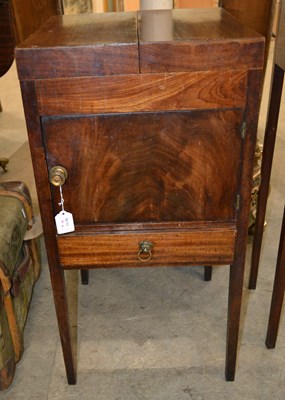 Lot 1182 - A 19th century mahogany pot cupboard, with a...