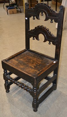 Lot 1190 - A 19th century oak hall chair, the upright...