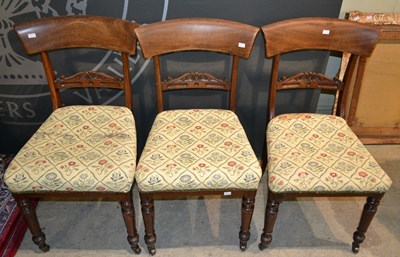 Lot 1194 - A set of three 19th century mahogany chairs,...