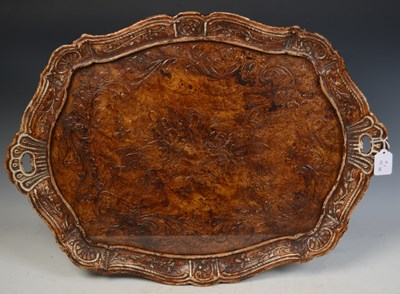 Lot 850 - A carved composite tray of traditional style,...