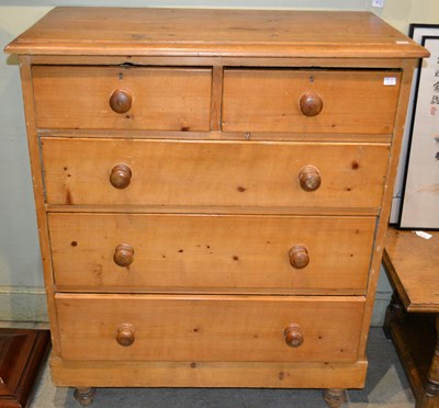 Lot 1208 - A 19th century two over three pine chest of...