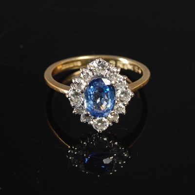 Lot 347 - An 18ct yellow and white gold sapphire and...