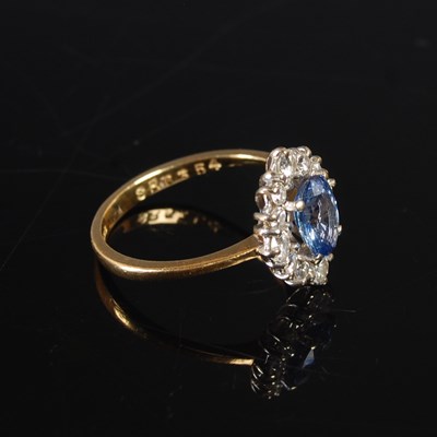 Lot 347 - An 18ct yellow and white gold sapphire and...