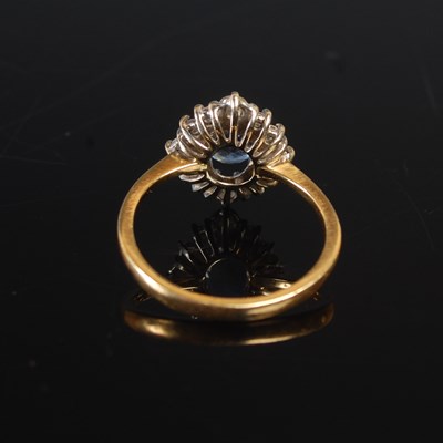 Lot 347 - An 18ct yellow and white gold sapphire and...