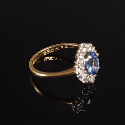 Lot 347 - An 18ct yellow and white gold sapphire and...