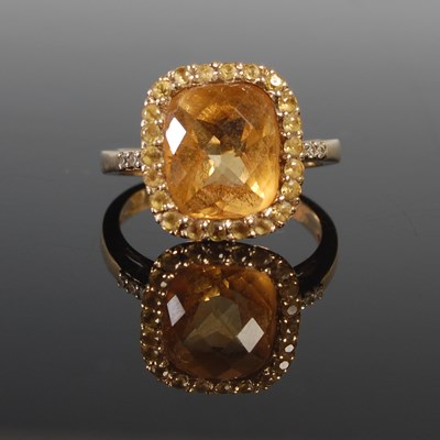 Lot 348 - A 9ct gold citrine and yellow sapphire cluster...