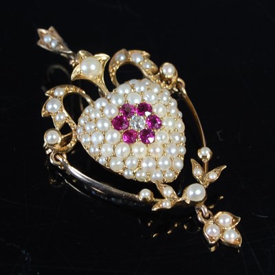 Lot 391 - An Edwardian gold, pearl, ruby and diamond...