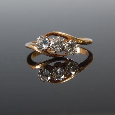 Lot 326 - A 1920’s diamond three-stone ring, set with...