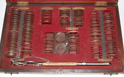 Lot 278 - A vintage optometry set in fitted wooden case