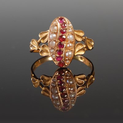Lot 336 - An Art Nouveau 18ct. gold ring, set with a...