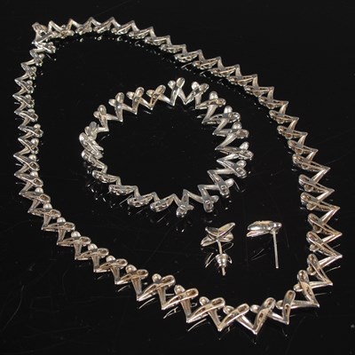 Lot 301 - Altinbas, a 14ct white gold and diamond...