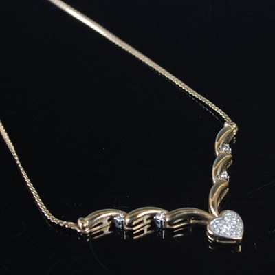 Lot 312 - A 9ct gold and diamond set centrepiece...