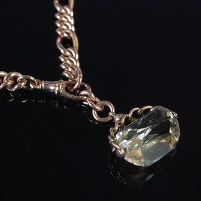 Lot 314 - A vintage 9ct gold Figaro chain, suspending a...