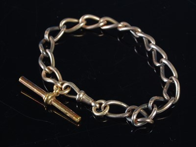 Lot 315 - A smart vintage yellow metal oval link...