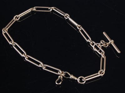 Lot 322 - A vintage yellow metal trombone link Albert...