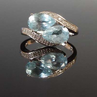 Lot 323 - A 9ct white gold aquamarine and diamond set...