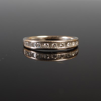 Lot 359 - An 18ct gold and diamond half-hoop ring, set...