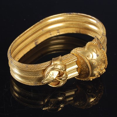 Lot 368 - A late 19th century articulated yellow metal...